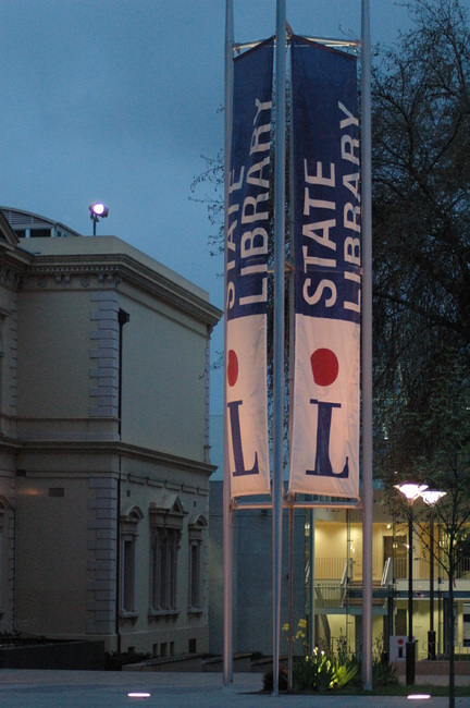 State Library banners glowing in the half-light