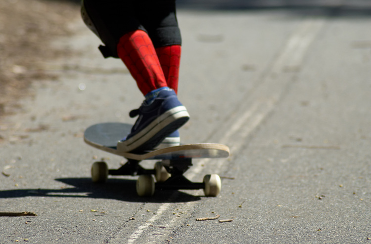 Skateboard and legs detail