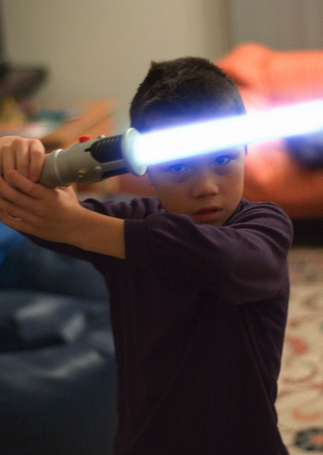 Michael poses with his light sabre (light saber)