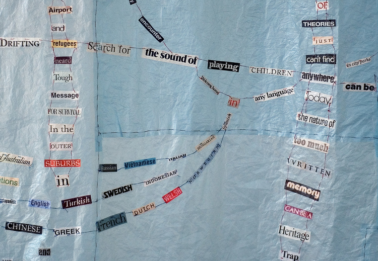 Words sewn onto a substrate, intermeshed to create related phrases