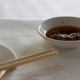 Chopsticks and chilli-sauce