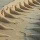 Machine tracks in soft sand