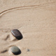 Pebbles on wet sand