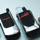 Three replica mobile phones, and one real one
