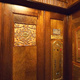 The wood panelled interior of 1930's lift